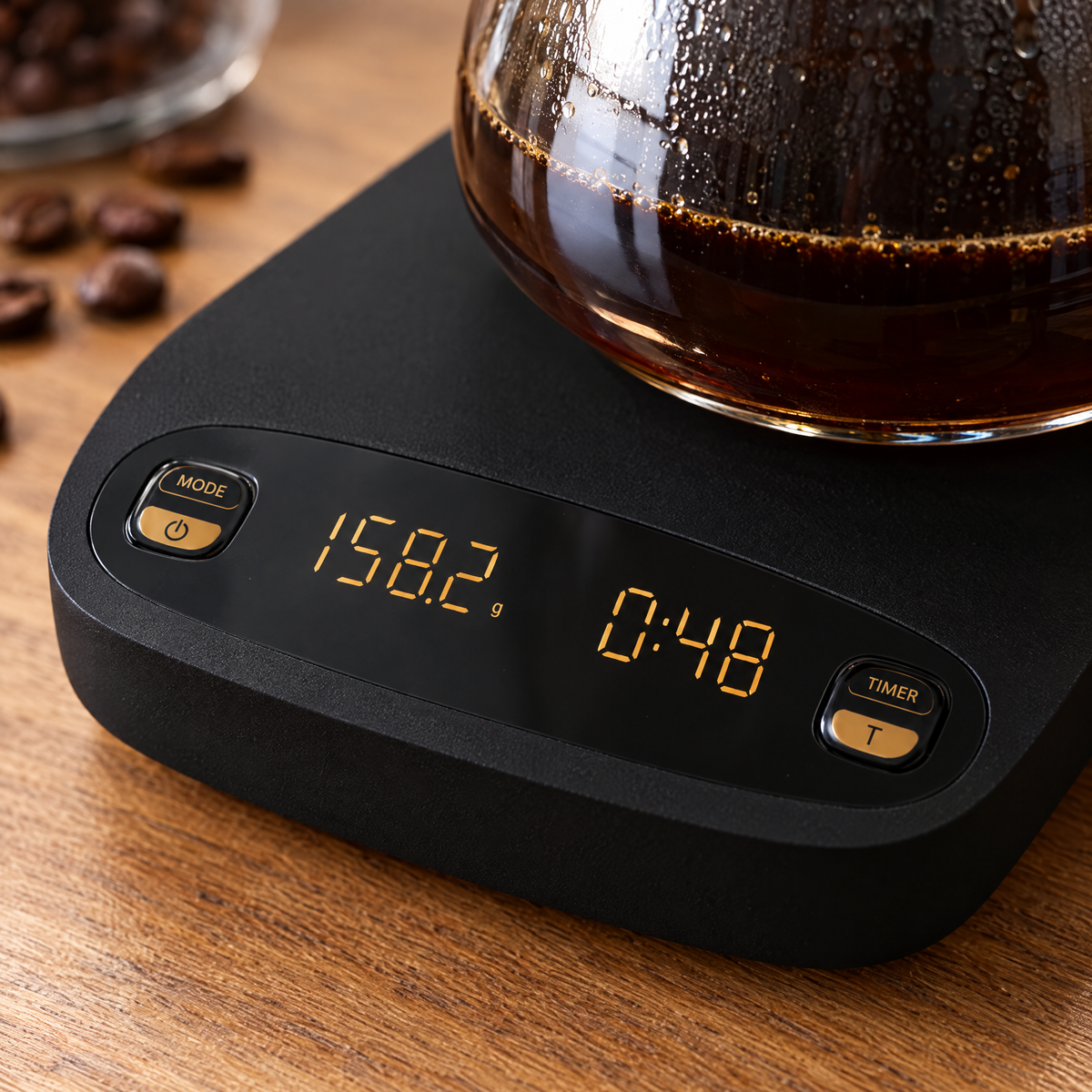 Close-up of the coffee scale LCD display and buttons