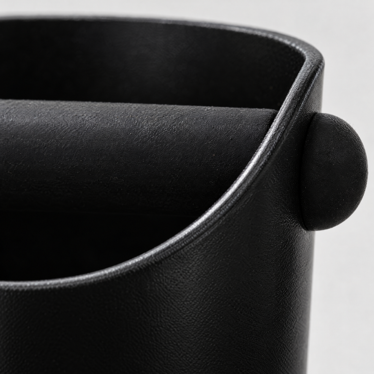 Close-up of the padded knock bar on the knock box